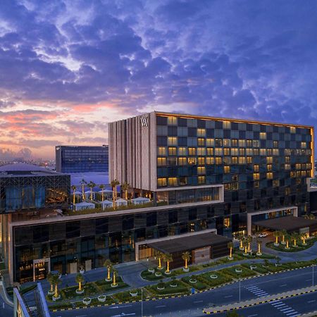 Hotel Waldorf Astoria Kuwait à Koweït Extérieur photo The hotel at sunset