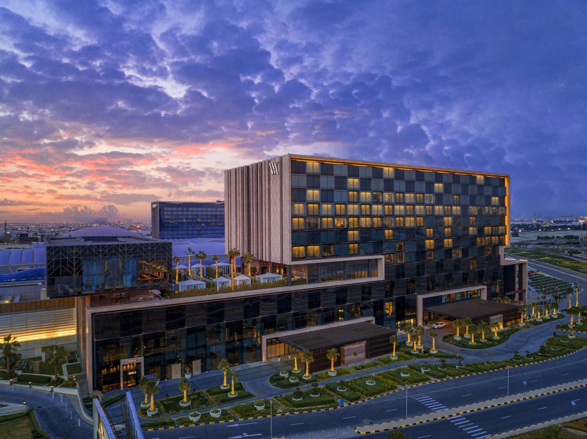 Hotel Waldorf Astoria Kuwait à Koweït Extérieur photo The hotel at sunset